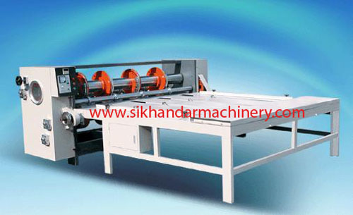 DIE-CUTTING AND SLOTTING MACHINE